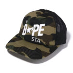 BAPE 1st Camo BAPE Sta Mesh Cap - Green, features the iconic BAPE Sta logo against the signature 1st Camo pattern, creating a unique and bold statement.