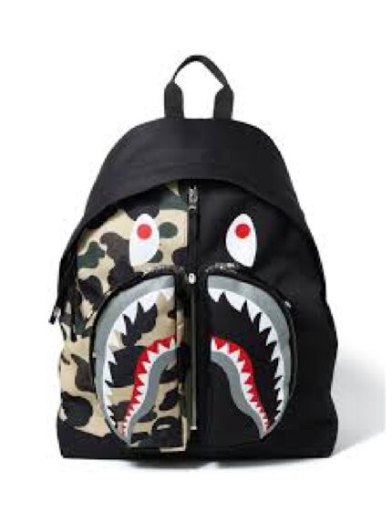 BAPE 1st Camo Shark Day Pack - Yellow, featuring the iconic BAPE camouflage pattern and Shark design.