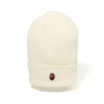 BAPE Ape Head One Point Beanie White, making a bold statement in your cold-weather wardrobe.