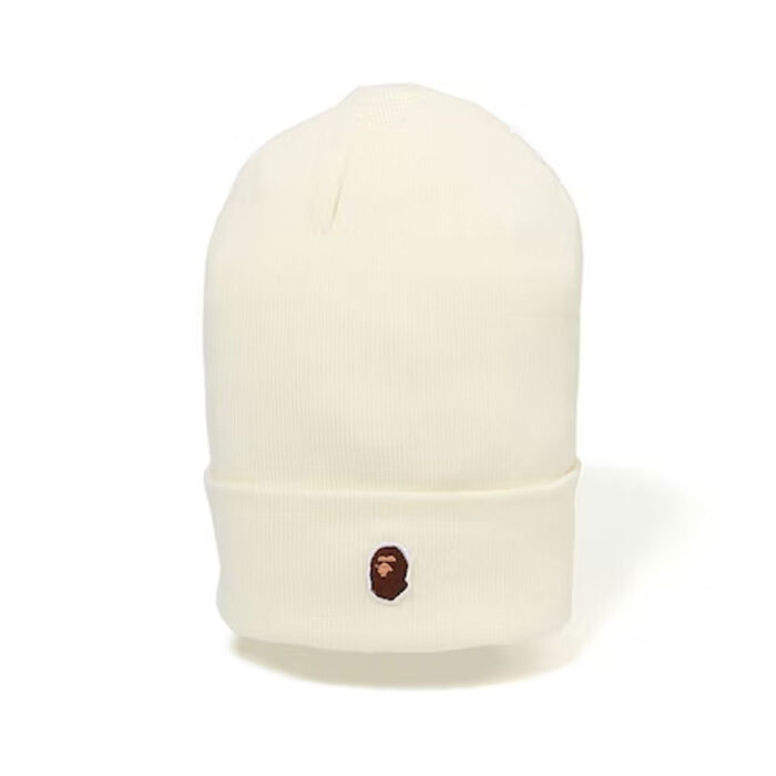 BAPE Ape Head One Point Beanie White, making a bold statement in your cold-weather wardrobe.