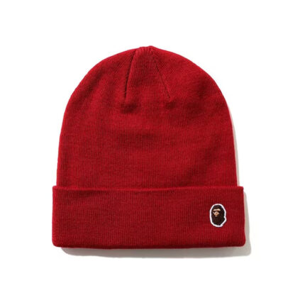 BAPE Ape Head One Point Knit Cap (FW20) - Red, featuring the iconic Ape Head logo as a stylish focal point. Make a statement with this classic knit cap during the winter season.