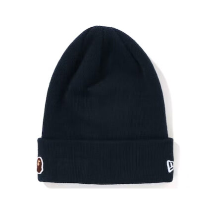 BAPE Ape Head One Point New Era Knit Beanie - Navy, adding a touch of urban sophistication to your cold-weather ensemble.