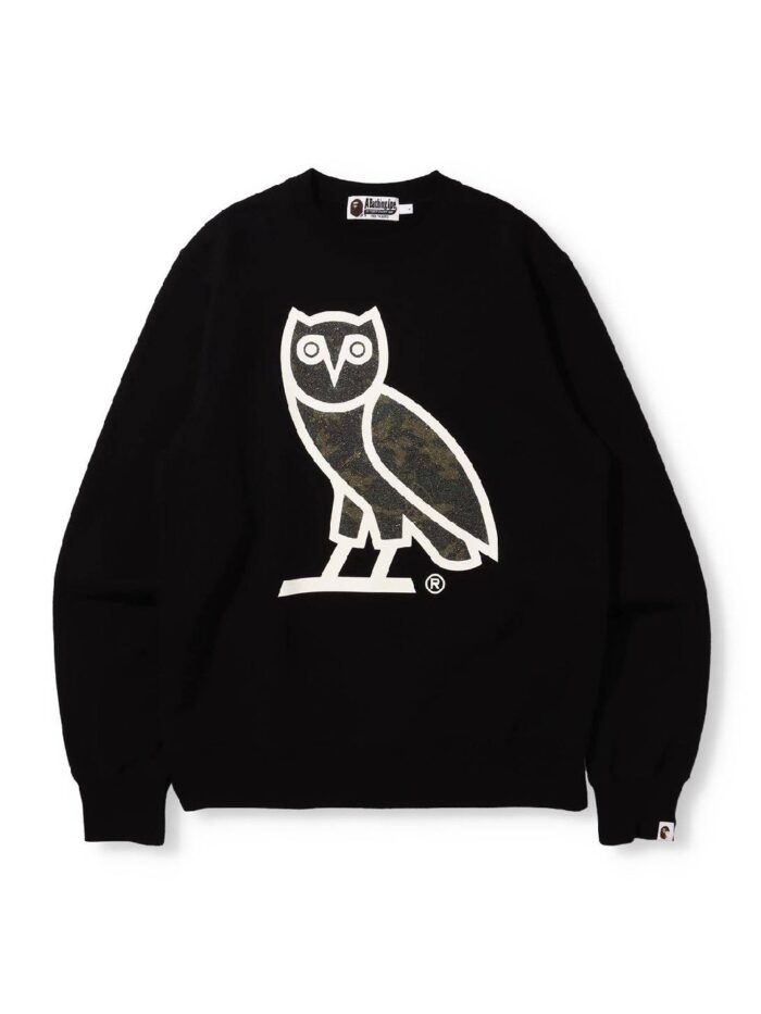 BAPE x OVO Glass Beads Woodland Camo Crewneck- Black, street style with this unique piece blending BAPE's iconic camo and OVO's distinctive touch.